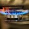 Combustion of household gas on a gas stove, gas energy saving concept.