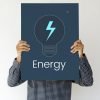 Man holding a board with Energy concept